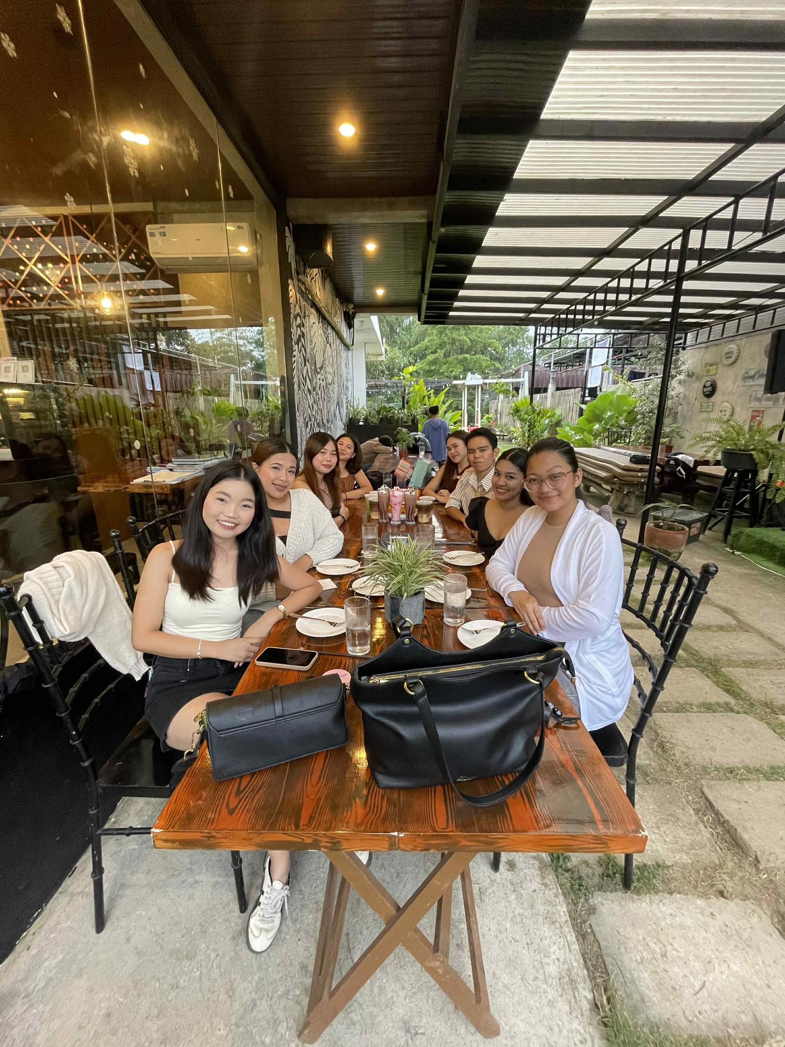 Guests dining on the outdoor terrace at Lola's Plates and Pours, Trece Martires Cavite